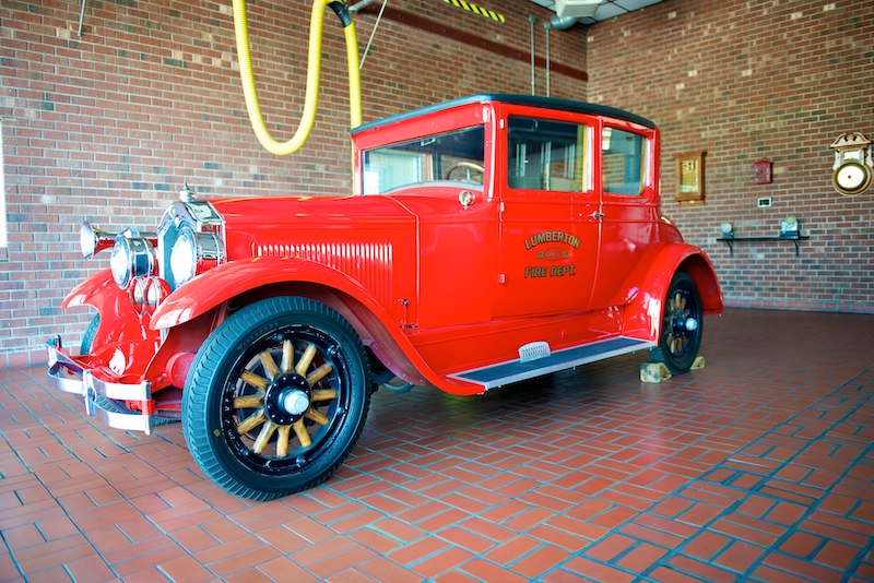 An old fashion fire truck.